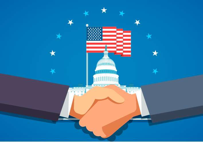 2 People shaking hands in front of the capitol